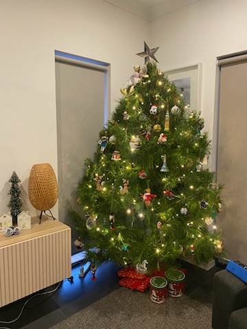Beautifully decorated Christmas tree with ornaments and lights